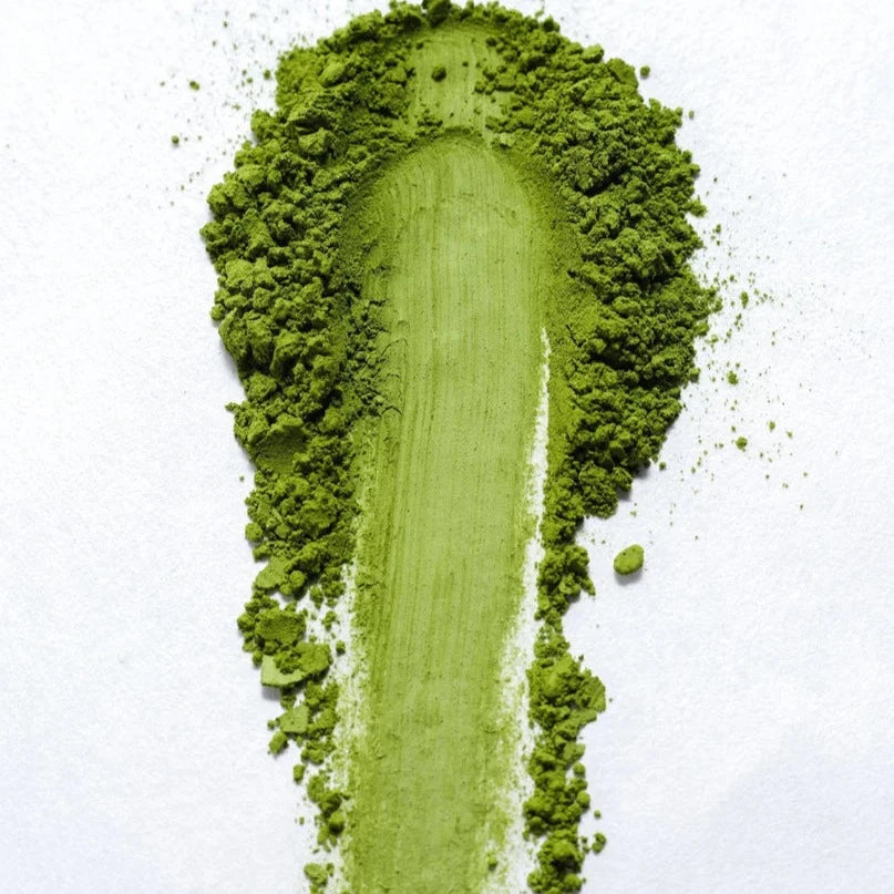 Photo courtesy of Kettl. Matcha powder on white background.
