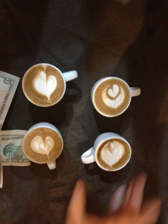 Latte art throwdown with four challengers.