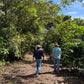 Two coffee producers walking through Finca Patzibir.